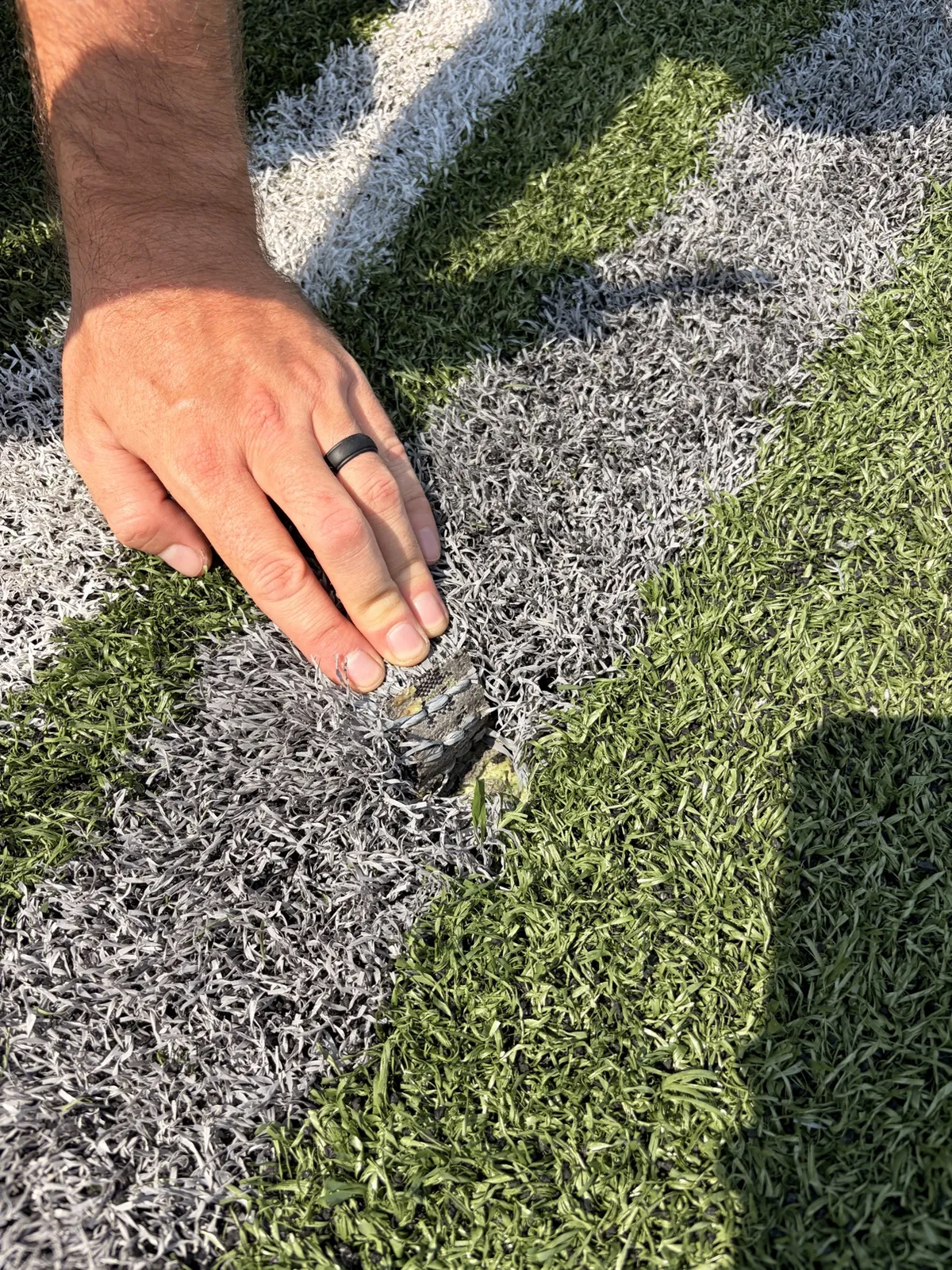 Synthetic turf seam repair and maintenance