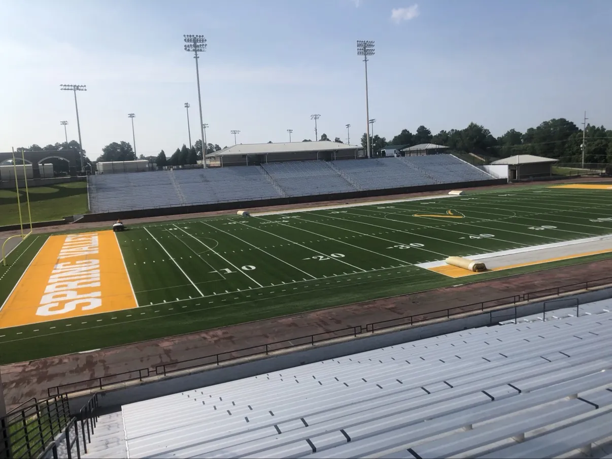 Football stadium with custom inlays