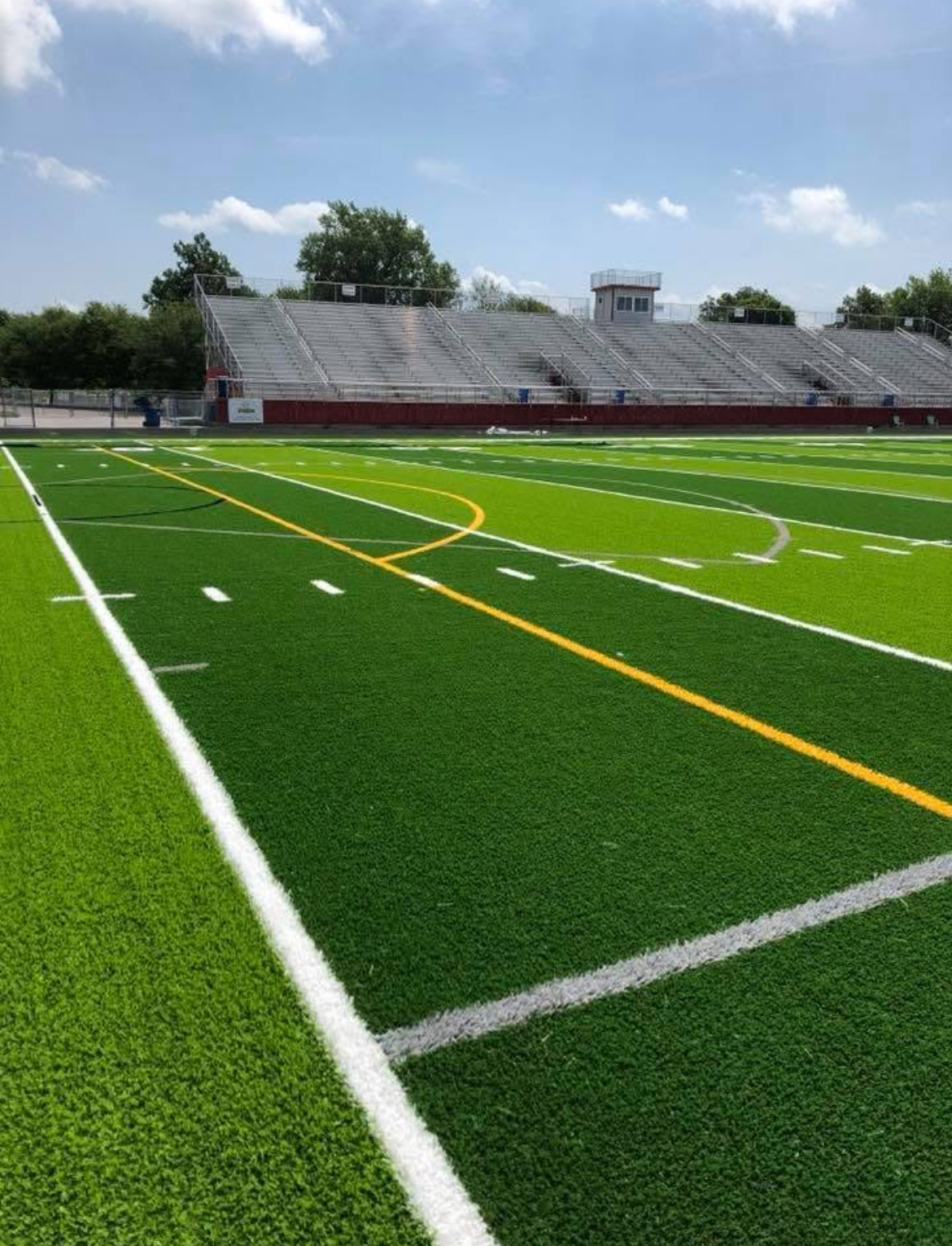 Artificial turf sports field installation