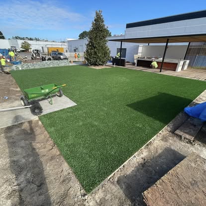 Hospitality patio with synthetic turf